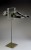 bronze figure on steel stand