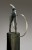 bronze figure on steel stand