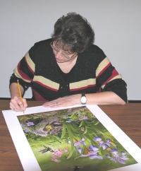 Judy Schrader signing prints