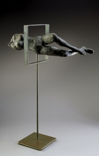 bronze figure on steel stand